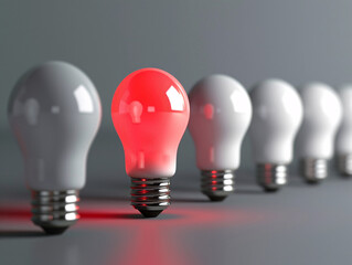 Glowing Red Light Bulb in a Line of White Bulbs
