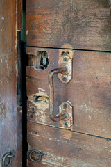 Old wooden door and iron handle