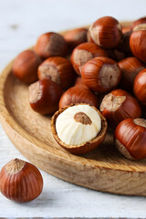 hazelnuts on a wooden plate
