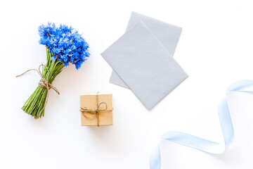 Summer flowers pattern with bouquet of blue cornflowers, envelop