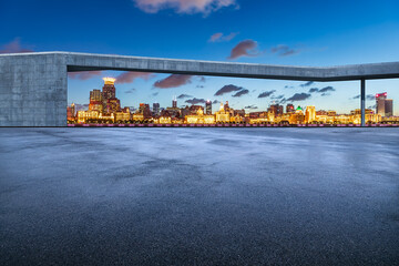 Obraz premium Asphalt road square and city skyline with modern buildings at night in Shanghai