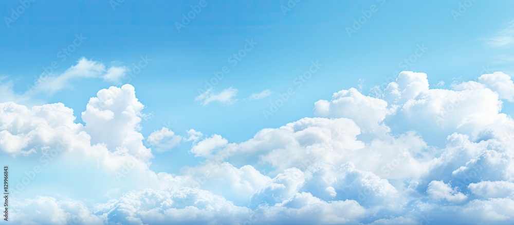 Poster Abstract background featuring a blue sky and clouds with ample space for additional content or text