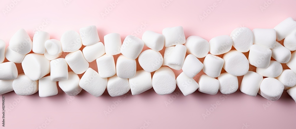 Poster A white background with marshmallows arranged leaving space for other elements in the image. with copy space image. Place for adding text or design