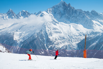 Skiers on resort in the French Alps