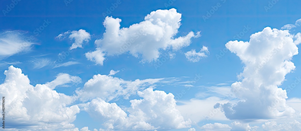 Aufkleber blue sky with white clouds as a copy space image for a background