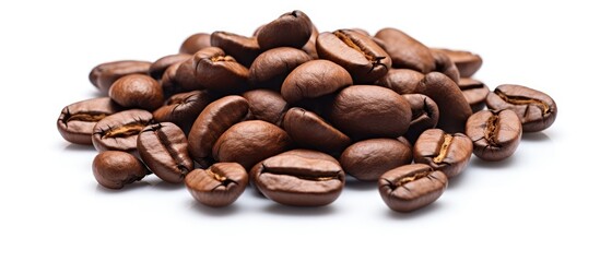 Naklejka premium The macro image of isolated roasted coffee beans against a white background offers a textured backdrop with plenty of copy space for accompanying text