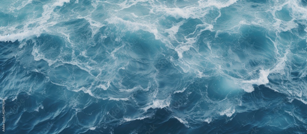 Aufkleber a top down view of ocean waves creating water patterns suitable as a background image with copy spac