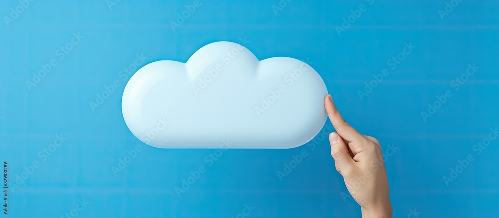 Poster On a blue background an individual s hand grasps a paper cutout of a speech bubble It offers plenty of room for adding text or images. with copy space image. Place for adding text or design