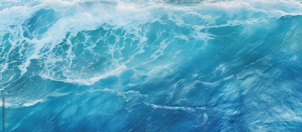 Poster A top down view of ocean waves creating water patterns suitable as a background image with copy space