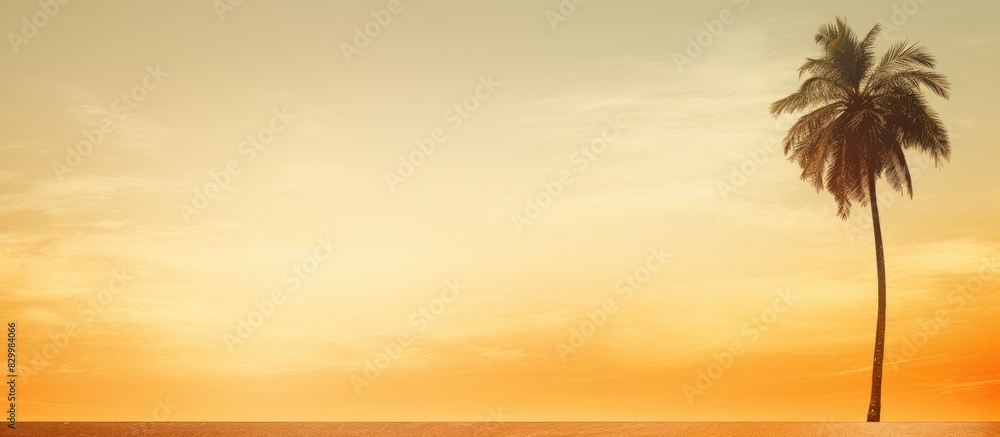 Poster a golden background enhances the beauty of a picturesque scene featuring a solitary palm tree creati