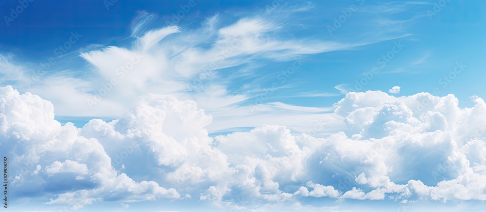 Poster a breathtaking sky filled with fluffy white clouds perfect for capturing a stunning image with ample