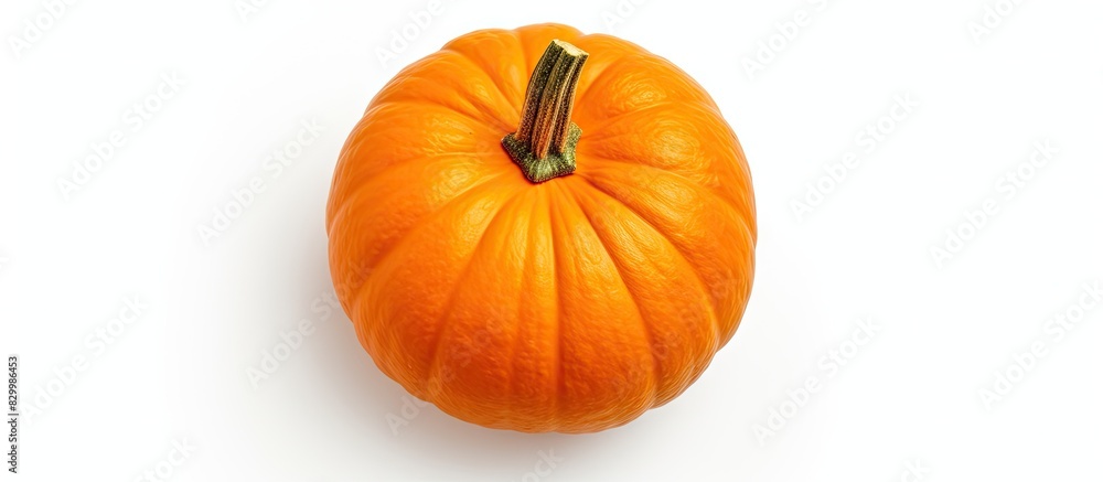 Poster a close up top view of a ripe orange pumpkin isolated on a white background with copy space image