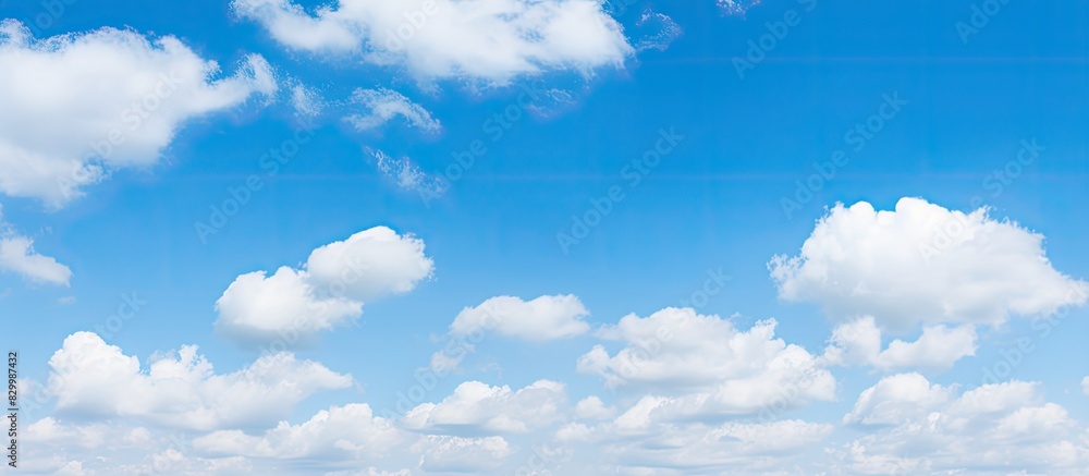 Poster a nature background with a blue sky and white clouds copy space image