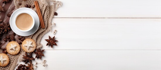 Cozy autumn or winter composition with a cup of coffee cozy knitted plaid chocolate cookies cinnamon sticks star anise and dry leaves on a white background Top view with copy space image - Powered by Adobe