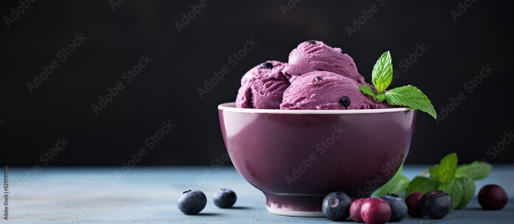 Poster a dairy free dessert consisting of a refreshing and nutritious homemade huckleberry ice cream adorne
