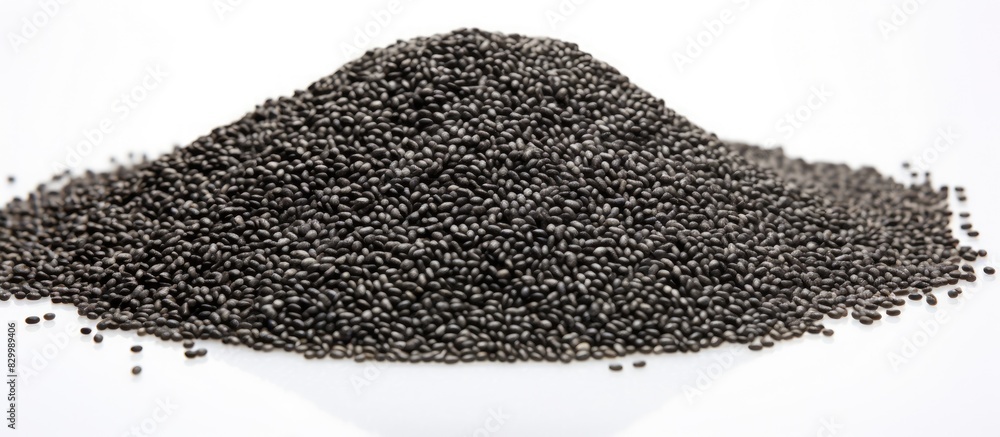 Poster copy space image of a heap of nutritious chia seeds set against a clean white backdrop lamiaceae