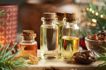 Christmas mix of essential oils with frankincense, myrrh and spruce tree branches
