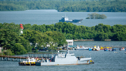 Columbian coast navy ship alongside in port Buenaventura and another war ship behind © Maritime Art Blog