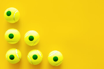 Set of green tennis balls, top view. Sport games background