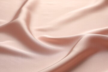 Crumpled pink silk fabric as background, closeup