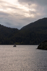 Cloud-covered mountains over British Columbia sea