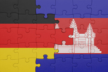 puzzle with the colourful national flag of cambodia and flag of germany.