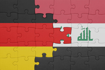 puzzle with the colourful national flag of iraq and flag of germany.
