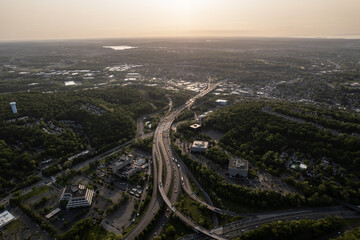 Sunrise Over a Cityscape Looking at a Tangled Highway