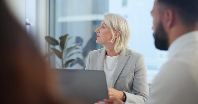 Woman, laptop and employees in office for discussion, mature manager and hr in workplace for company dispute. Conversation, tech and meeting minutes with people together, peace and calm for strategy