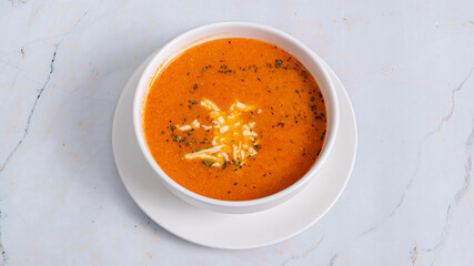 Tomato soup bowl top view isolated