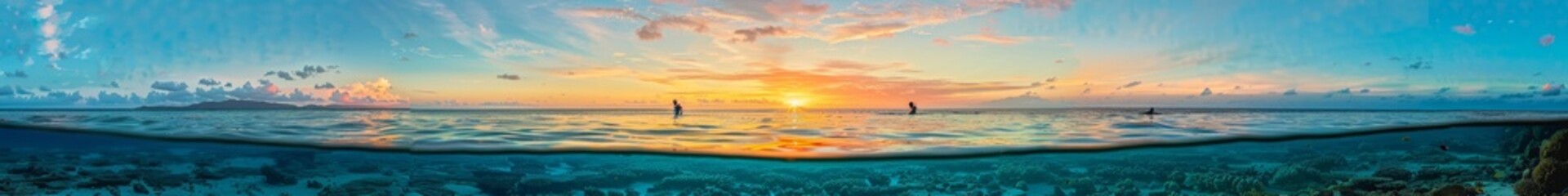 Fototapeta premium A beach with crystal-clear water and vibrant coral reefs visible just below the surface. Snorkelers explore the underwater world while the sun sets, casting beautiful colors across the sky.