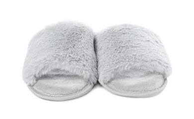 Pair of soft slippers with fur isolated on white