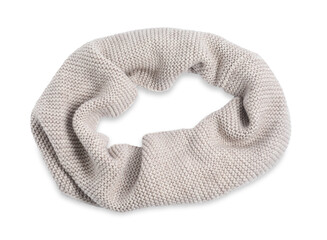 One beige knitted scarf on white background, top view