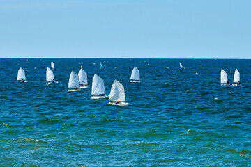 Blue sea sailing regatta, nautical spectacle sport sailing competition among yacht club...