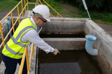 Environmental engineers work at wastewater treatment plants,Water supply engineering working at Water recycling plant for reuse