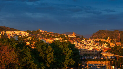 Golden hour over a mediterranean hillside town
