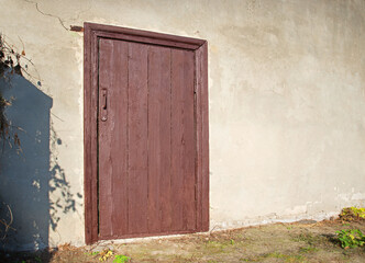 Old wooden door to a vintage dwelling