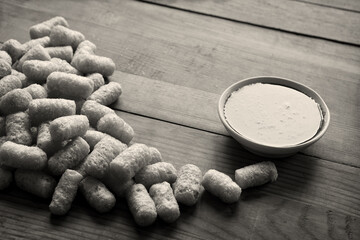 Corn sticks on wooden background