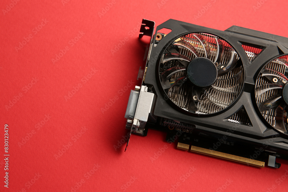 Fototapete one graphics card on red background, top view. space for text