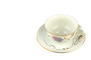 Vintage porcelain cup and saucer isolated on white. There is free space for text.