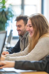 Fototapeta premium happy people at work, smiling man and woman working together on computer at office, 