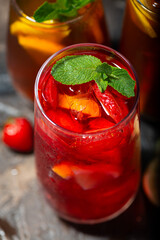 assortment of refreshing cold black and fruit tea, top view vertical