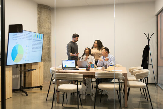 Diverse Team Collaborating in Modern Coworking Space
