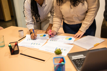 Collaborative team working on project in coworking space