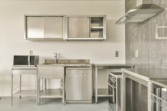 Modern stainless steel kitchen interior at Bos en Lommerweg 276