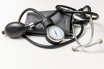 blood pressure monitor is on a white table 