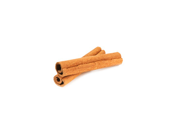 Cinnamon sticks isolated on white background. Cinnamon roll. Spicy spice for baking, desserts and drinks. Fragrant ground cinnamon.