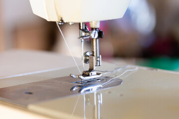 Close-up View of a Sewing Machine in a Workshop