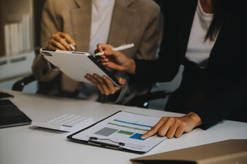 .Team of business people working together in the meeting room office, teamwork background charts...