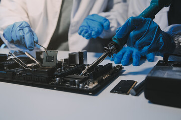 Close up of Technician measuring voltage electronic circuit board television, Service after sale fix electric equipment within insurance.